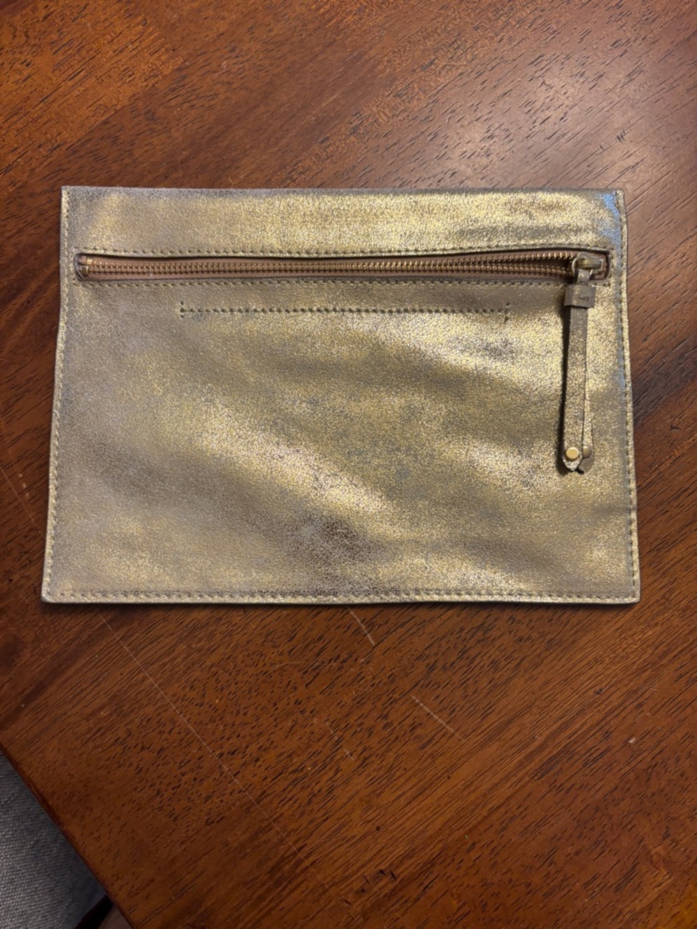 Banana Republic Metallic Gold Leather Zip  clutch never used